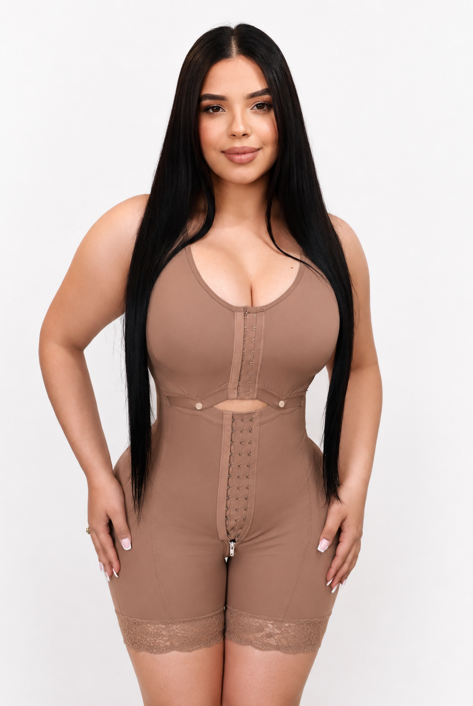 Woman wearing a brown shapewear jumpsuit on a white background