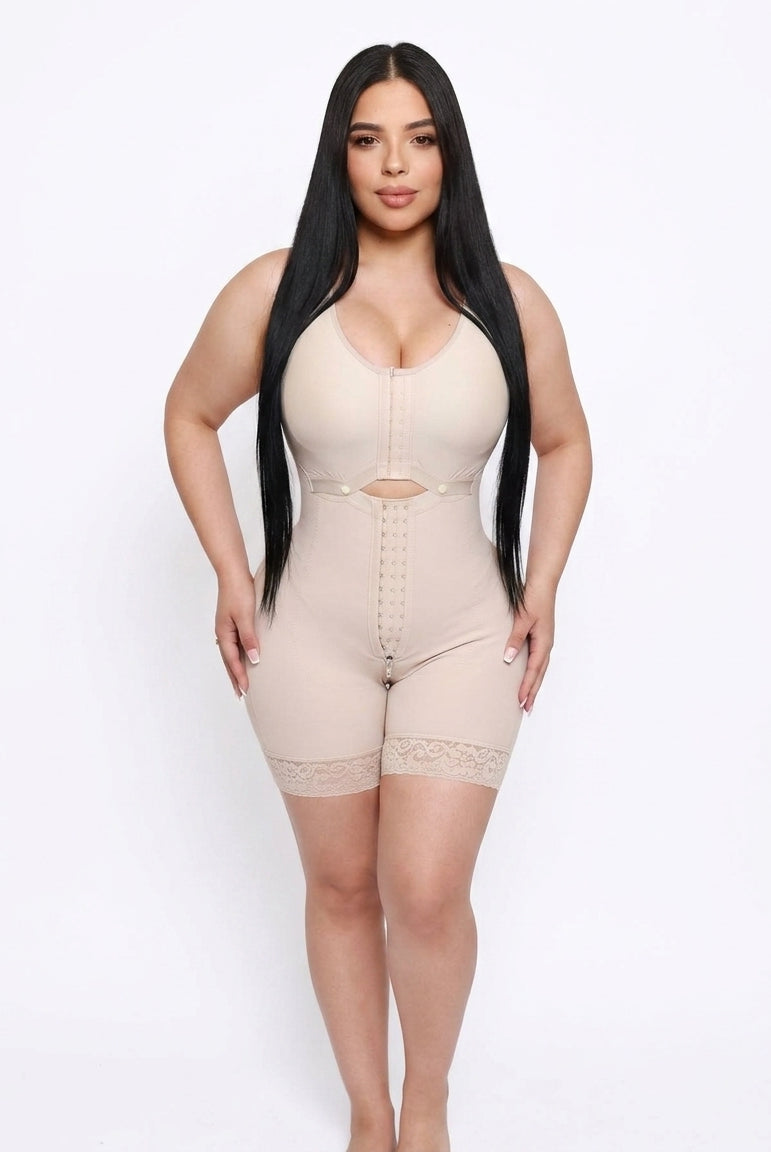 Woman wearing a beige shapewear garment on a white background